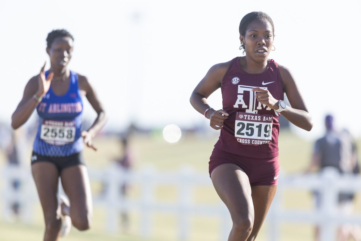 Freshman Maddie Peters fights to finish ahead during Texas A&amp;M's Arturo Barrios Invitational at Dale Watts '71 Cross Country Course on Friday, Oct. 18, 2024. (Adriano Espinosa/The Battalion)