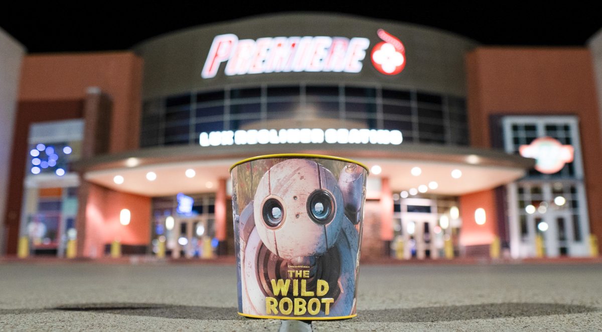 A promotional popcorn bucket featuring The Wild Robot outside of Bryan's Premiere Lux Cinema on Friday, Sept. 27, 2024. (Jenna Isbell/The Battalion)