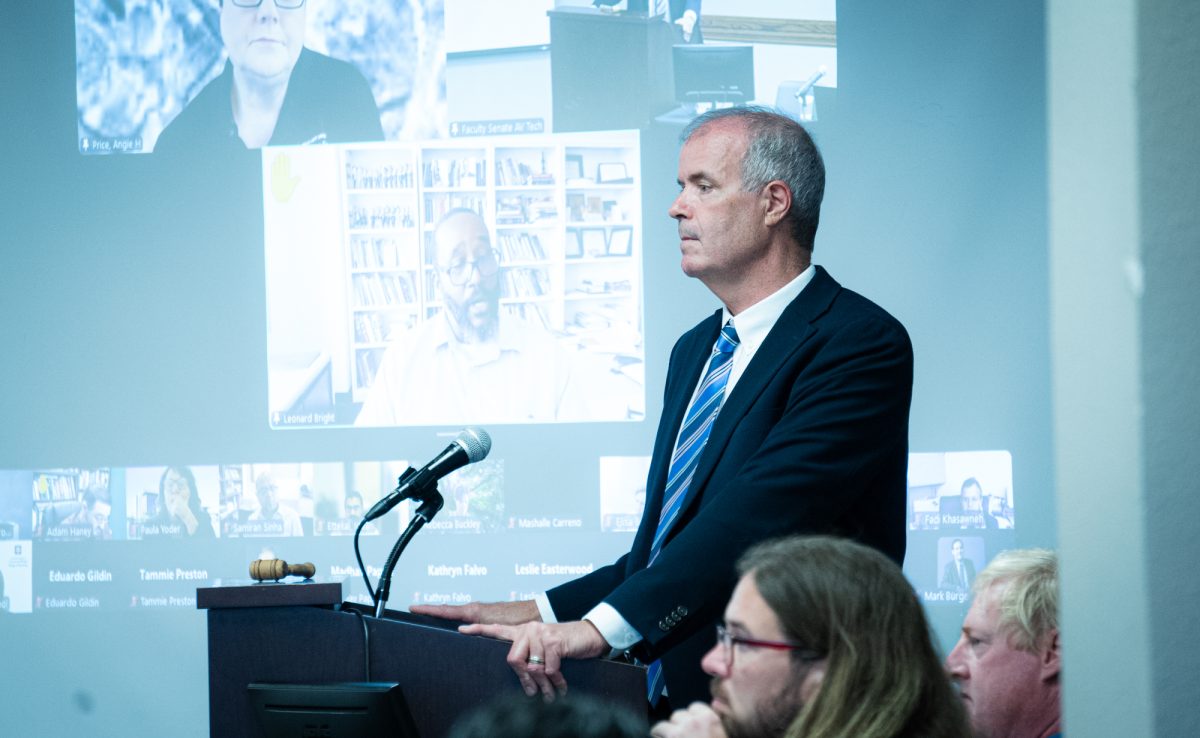 Provost Alan Sams listens to questions from faculty during the Faculty Senate meeting in Rudder Tower on Monday, Oct. 14, 2024. (Jenna Isbell/The Battalion)