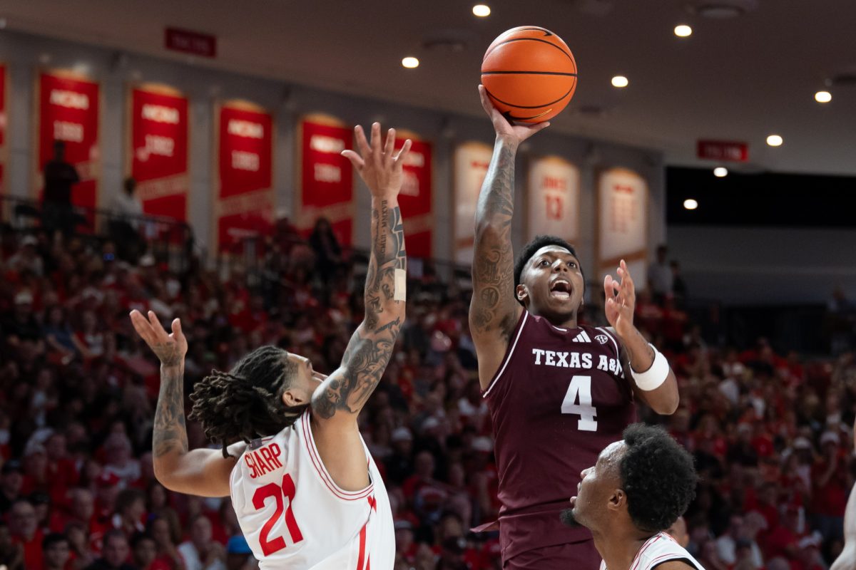 Texas A&amp;M Aggies guard Wade Taylor IV (4) makes a shot during Texas A&amp;M’s charity exhibition against Houston at Fertitta Center in Houtson, TX on Sunday, Oct. 27, 2024. (Chris Swann/The Battalion)