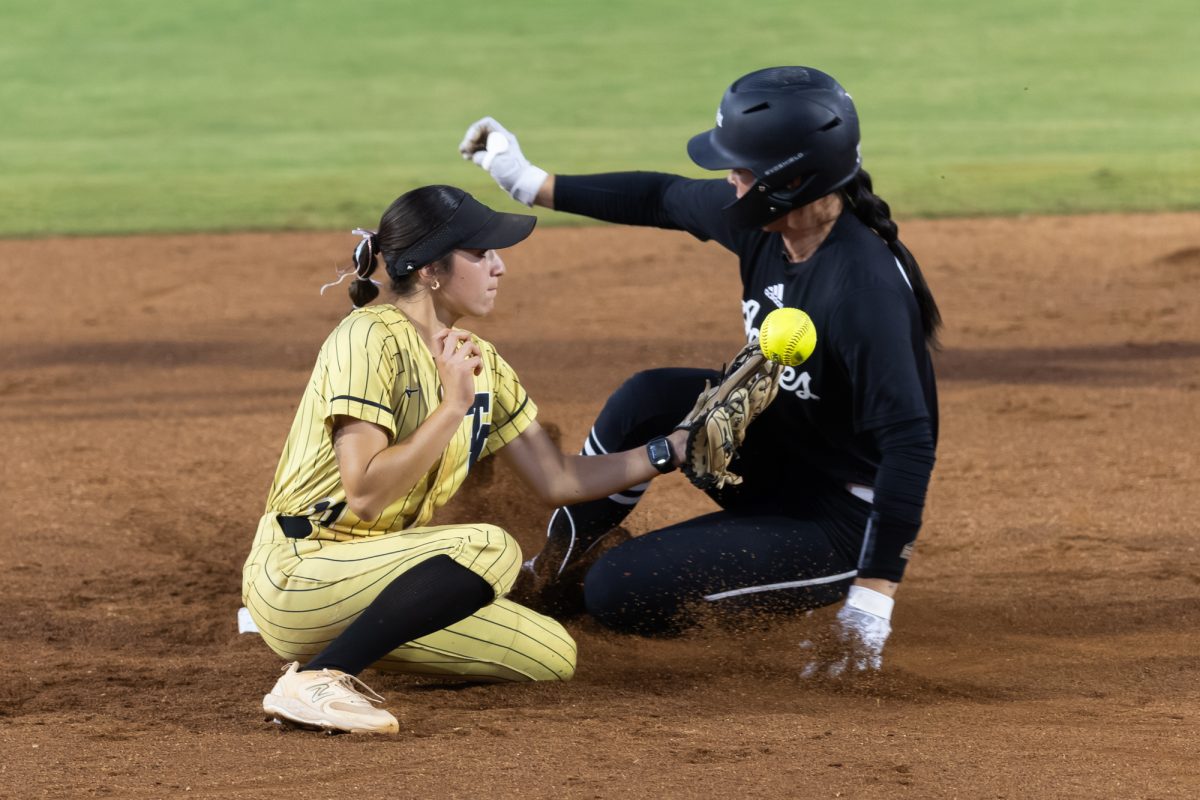 Trinity College Leopards infielder Anissa Hill (11) attempts to tag out Texas A&amp;M Aggies outfielder Allie Enright (33) during Texas A&amp;M’s exhibition game against Temple College at Davis Diamond on Tuesday, April 22, 2024. (Chris Swann/The Battalion)