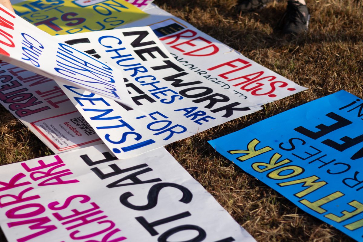 Signs made protesting against alleged abuses by the Christland Church on Saturday, Oct. 12, 2024. 