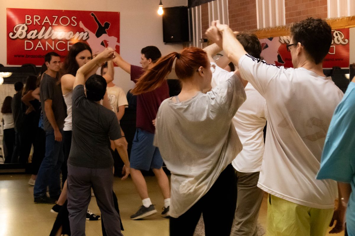 Members, led by founder Suma Datta, dance during the Aggie Westies West Coast Swing practice at the Brazos Ballroom on Wednesday, October 9, 2024. (Jessica Roppolo/The Battalion)