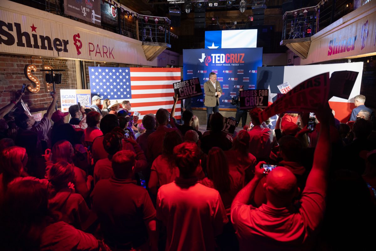 Supporters react as Sen. Ted Cruz is welcomed on stage during a campaign stop in College Station at Shiner Park on Friday, Oct. 18, 2024. (Chris Swann/The Battalion)