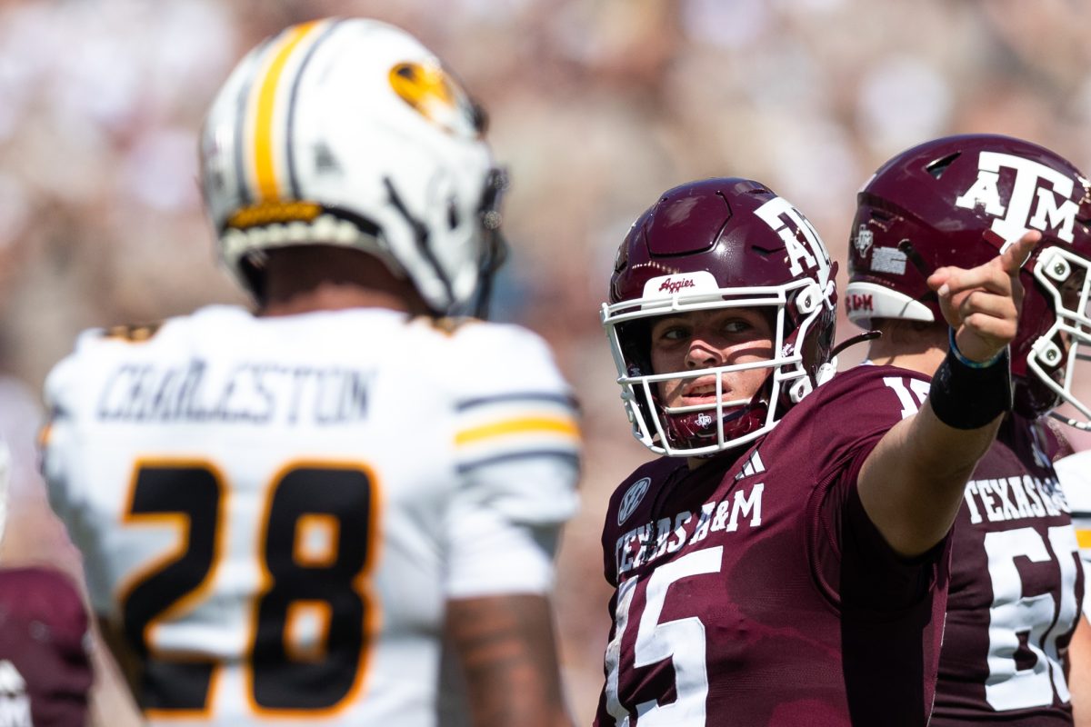 Texas A&amp;M Aggies quarterback Conner Weigman (15) reacts after rushing for a first down during Texas A&amp;M’s game against Missouri at Kyle Field Saturday, Oct. 5, 2024. (Chris Swann/The Battalion)