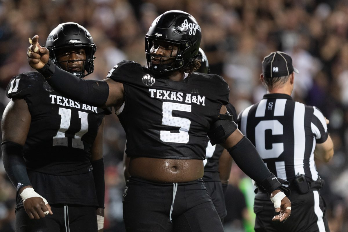 Texas A&amp;M Aggies defensive lineman Shemar Turner (5) reacts after a defensive stop during Texas A&amp;M’s game against LSU at Kyle Field on Friday, Oct. 25, 2024. (Chris Swann/The Battalion)