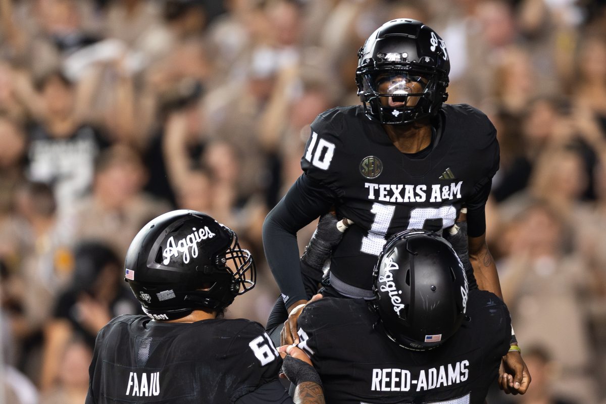 Texas A&amp;M Aggies quarterback Marcel Reed (10) lifted in the endzone by Texas A&amp;M Aggies offensive lineman Kolinu'u Faaiu (61) and Texas A&amp;M Aggies offensive lineman Ar'maj Reed-Adams (55) during Texas A&amp;M's game against LSU at Kyle Field on Saturday, Oct. 26, 2024. (Adriano Espinosa/The Battalion)