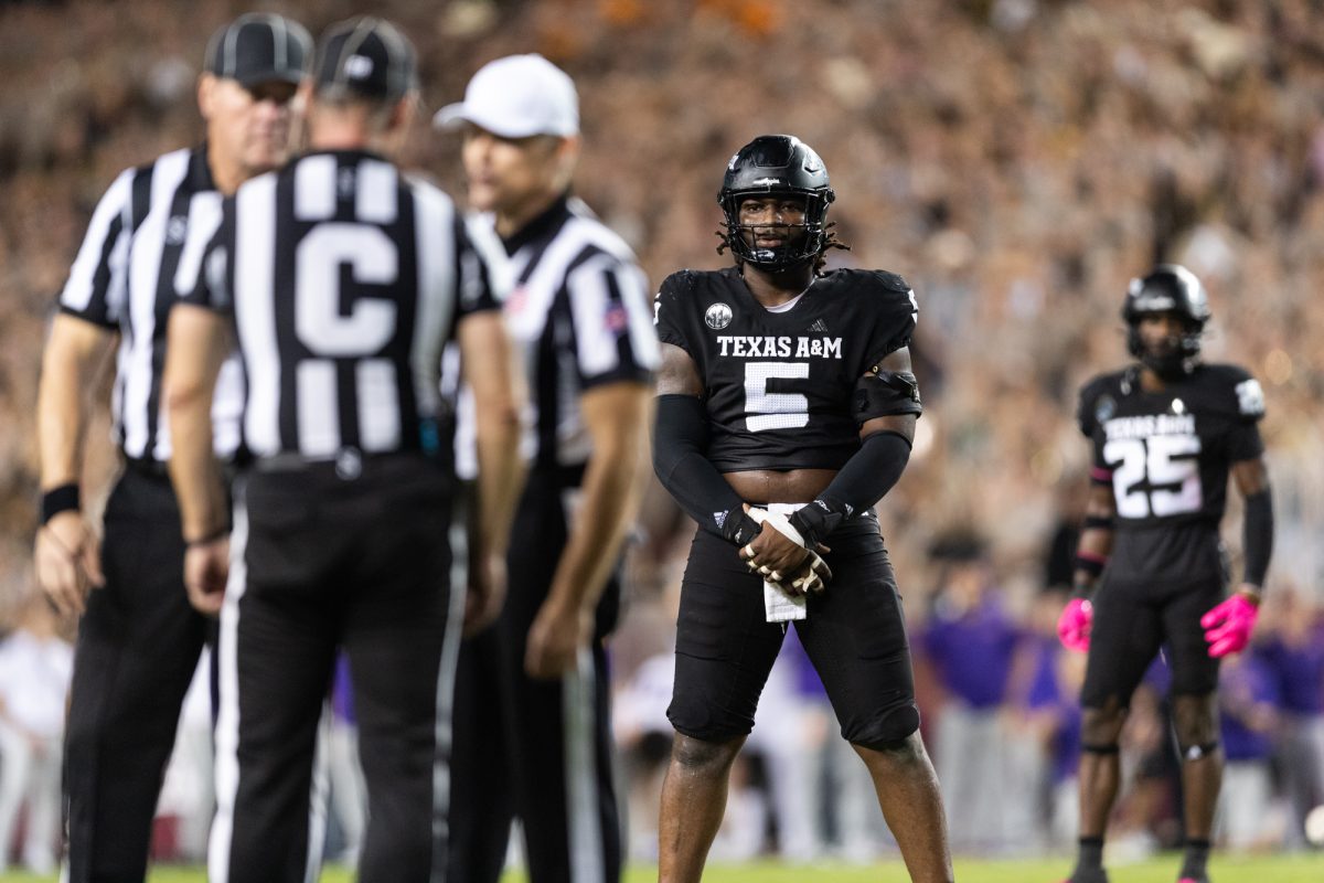 Texas A&amp;M Aggies defensive lineman Shemar Turner (5) watches the refs dispute his penalty during Texas A&amp;M's game against LSU at Kyle Field on Saturday, Oct. 26, 2024. (Adriano Espinosa/The Battalion)