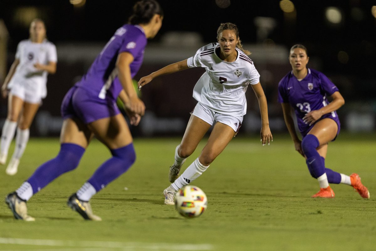 Texas A&M midfielder Sydney Becerra (7) dribbles through the defense during Texas A&M's game against LSU at Ellis Field on Friday, Oct. 18, 2024. (Adriano Espinosa/The Battalion)