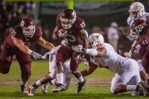 Texas A&amp;M running back Ben Malens (23) breaks a tackle off a Texas defender during Texas A&amp;M’s game against Texas at Kyle Field on November 24, 2011. (FILE)