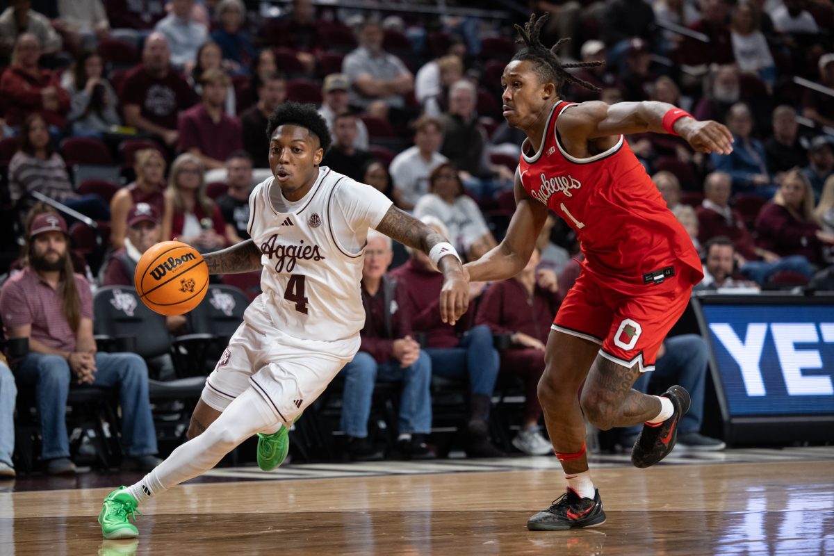 Texas A&amp;M guard Wade Taylor IV (4) drives to the basket during Texas A&amp;M’s game against Ohio State at Reed Arena on Friday, Nov. 15, 2024. (Chris Swann/The Battalion)