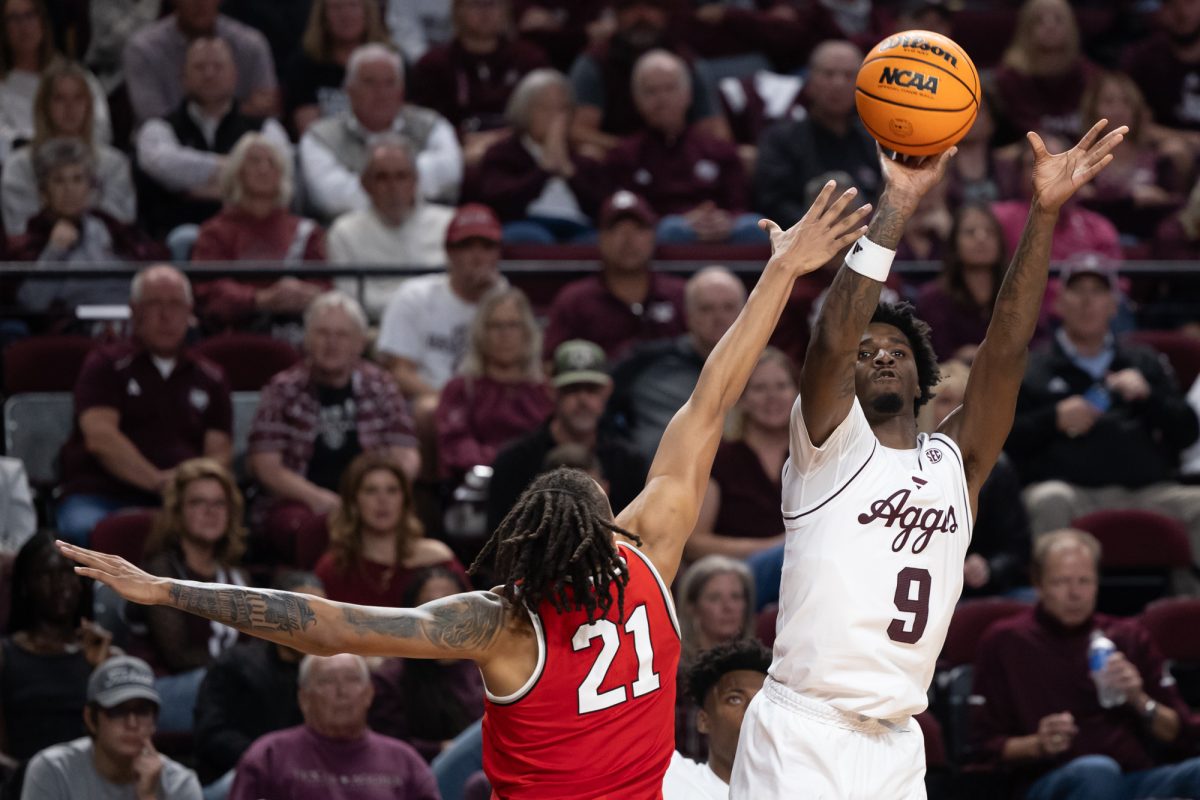 Texas A&amp;M forward Solomon Washington (9) shoots a three-pointer during Texas A&amp;M’s game against Ohio State at Reed Arena on Friday, Nov. 15, 2024. (Chris Swann/The Battalion)