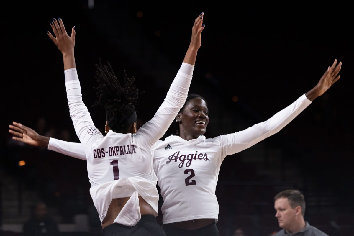 Texas A&amp;M middle blockers Ifenna Cos-Okpalla (1) and Ital Lopuyo (2) react during warmups before Texas A&amp;M’s game against LSU at Reed Arena on Sunday, Nov. 24, 2024. (Chris Swann/The Battalion)