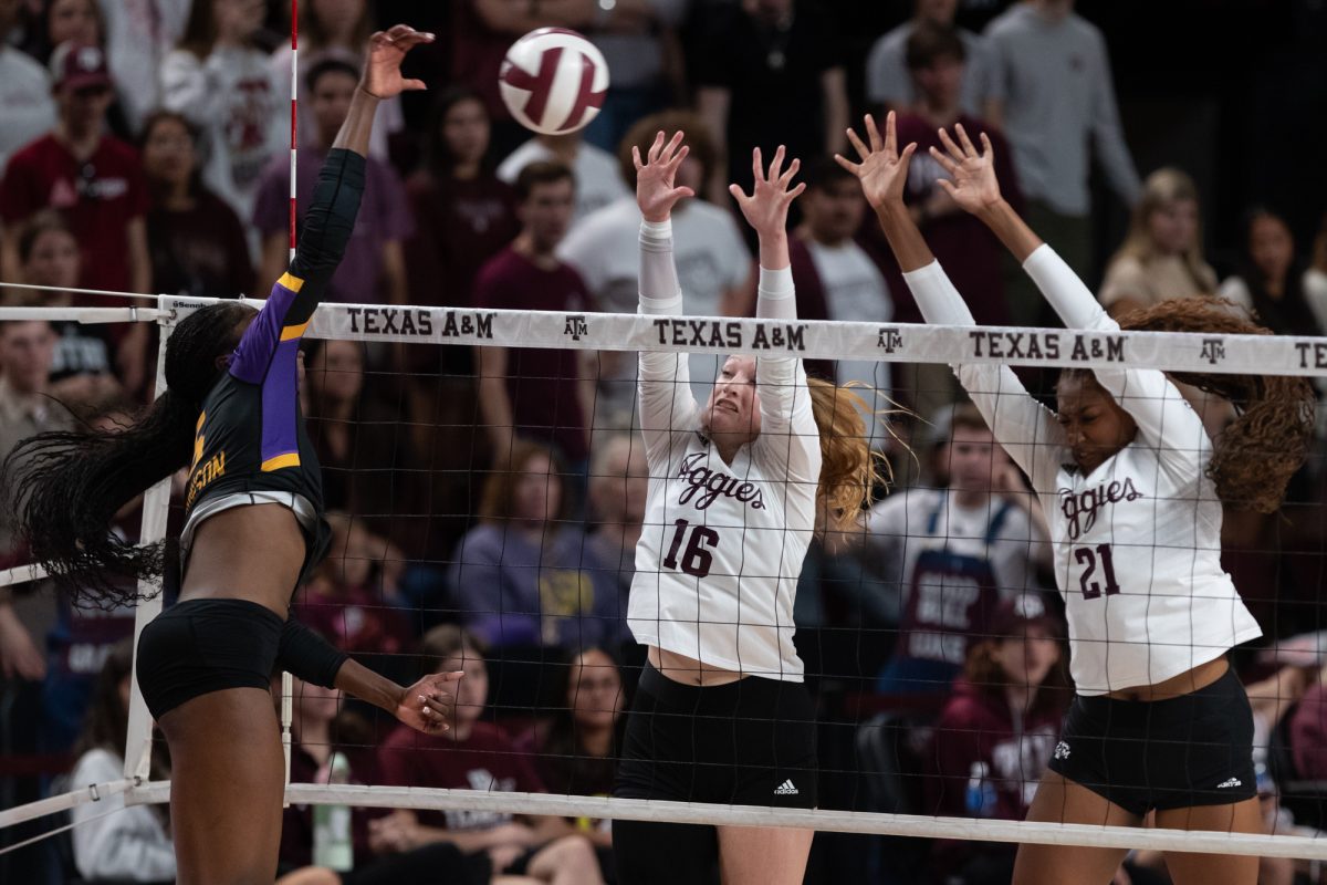 Texas A&amp;M outside hitter Caroline Meuth (16) and Texas A&amp;M middle blocker Morgan Perkins (21) attept to block the ball during Texas A&amp;M’s game against LSU at Reed Arena on Sunday, Nov. 24, 2024. (Chris Swann/The Battalion)