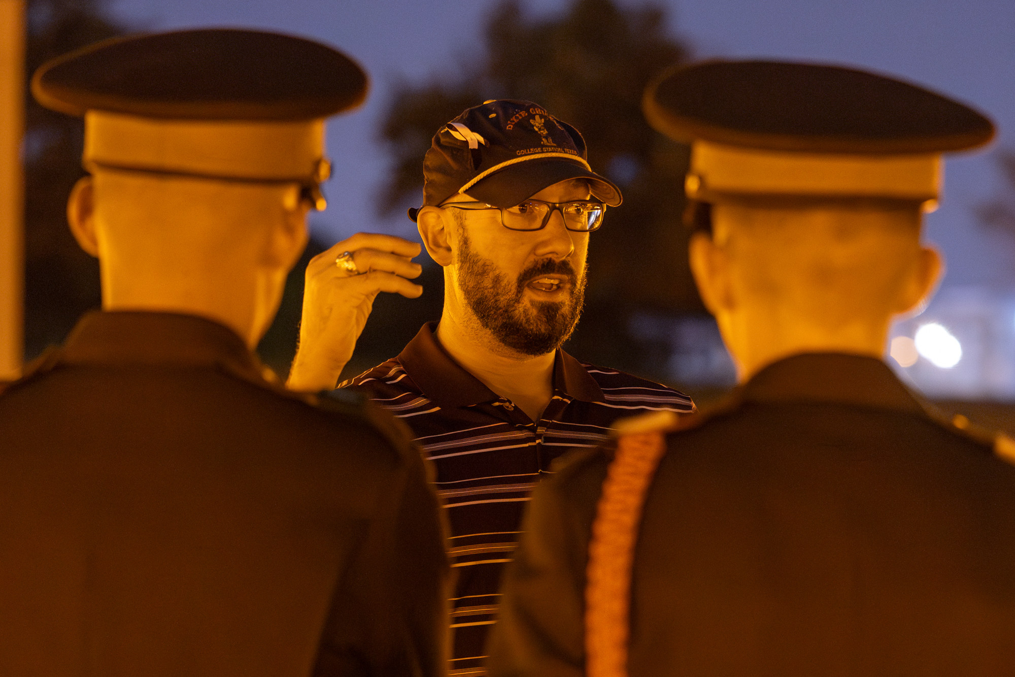 Bonfire collapse survivor Bill Davis, Class of 2002, speaks to members of the Corps of Cadets about his experience trapped in the stack after the Bonfire Remembrance Ceremony at the Bonfire Memorial on Monday, Nov. 18, 2024. 