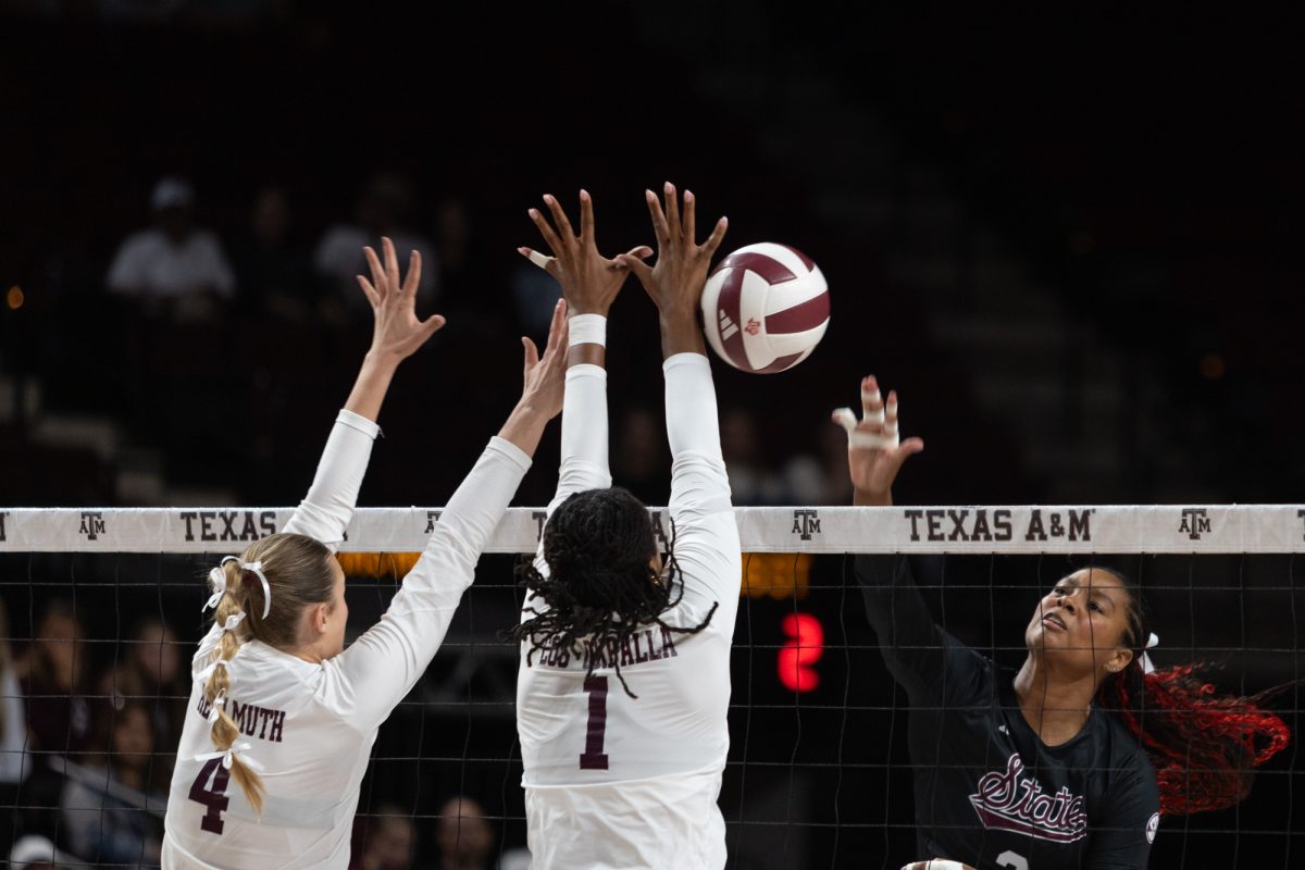 Texas A&amp;M middle blocker Ifenna Cos-Okpalla (1) and Texas A&amp;M outside hitter Emily Hellmuth block a spike by Mississippi St. middle blocker Zoe Gonzales (4) during Texas A&amp;M’s game against Mississippi State at Reed Arena on Sunday, Nov. 3, 2024. (Sarthak Dalal/The Battalion)