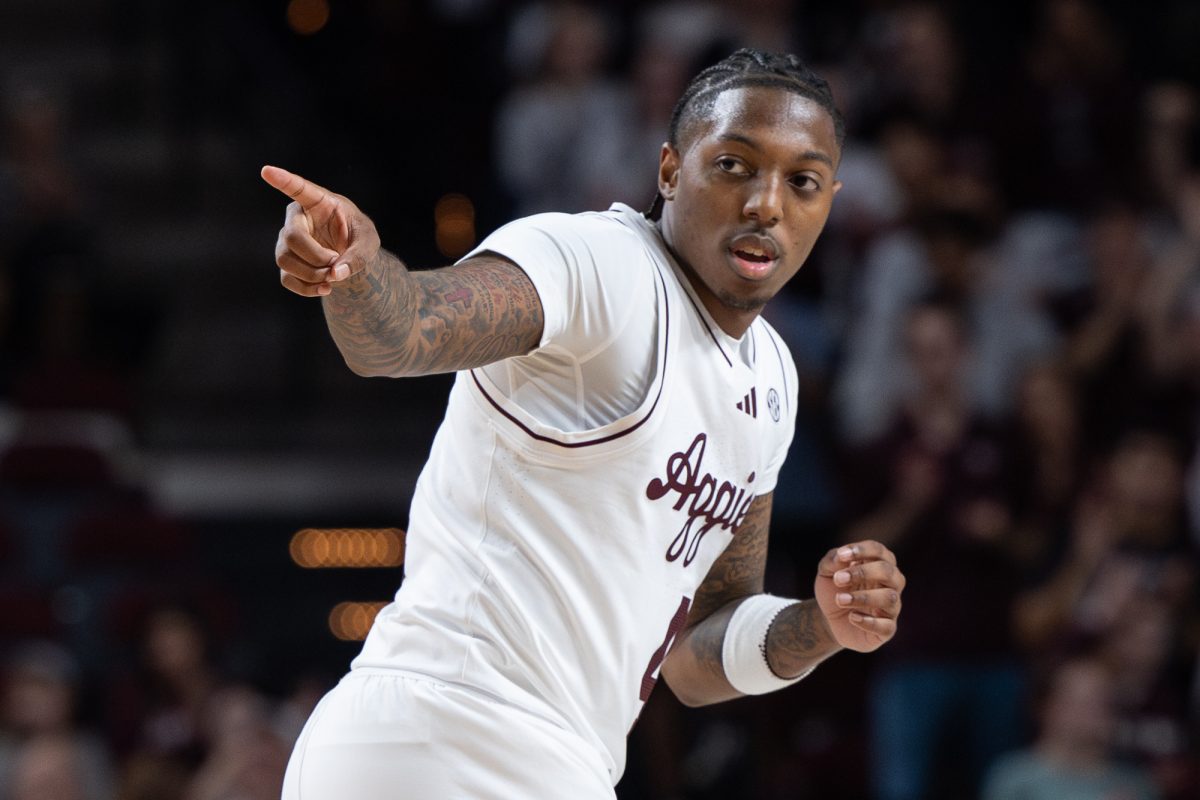 Texas A&amp;M guard Wade Taylor IV (4) reacts after scoring a three-pointer during Texas A&amp;M’s game against East Texas A&amp;M at Reed Arena on Friday, Nov. 8, 2024. (Chris Swann/The Battalion)