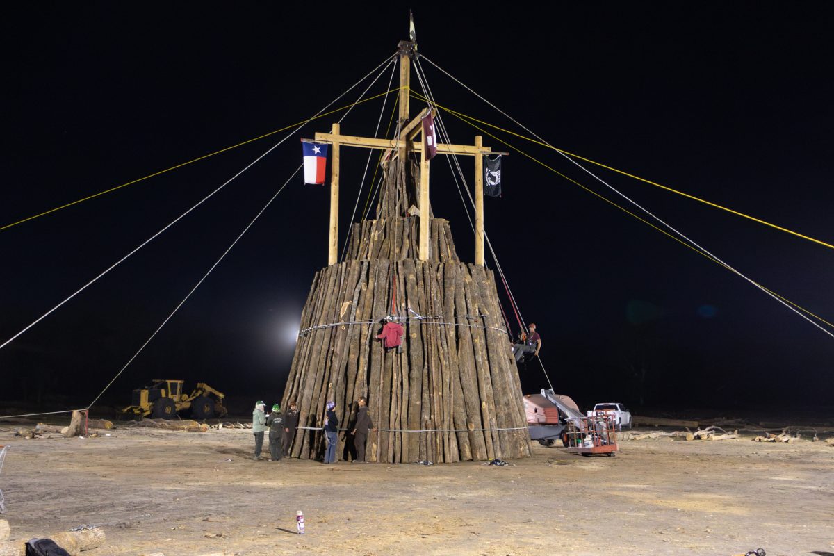 Aggies continue construction on the bonfire on Friday, Nov. 15, 2024.(Abdurahman Azeez/The Battalion)