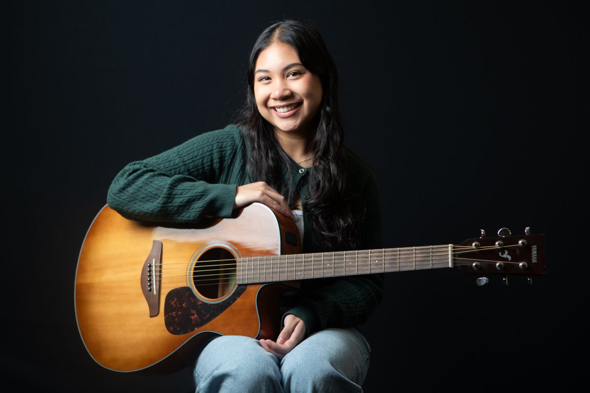 English junior and musician Jessica Pardede sits for a photo in The Battalion’s studio on Monday, Nov. 25, 2024. (Chris Swann/The Battalion)