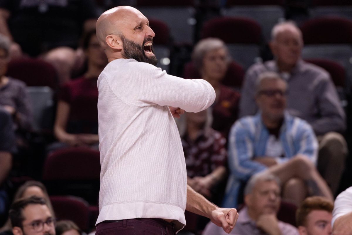 Head coach Jamie Morrison celebrates winning a point during Texas A&amp;M’s game against Mississippi State in Reed Arena Sunday, Nov. 3, 2024. (Kelii Horvath/The Battalion)