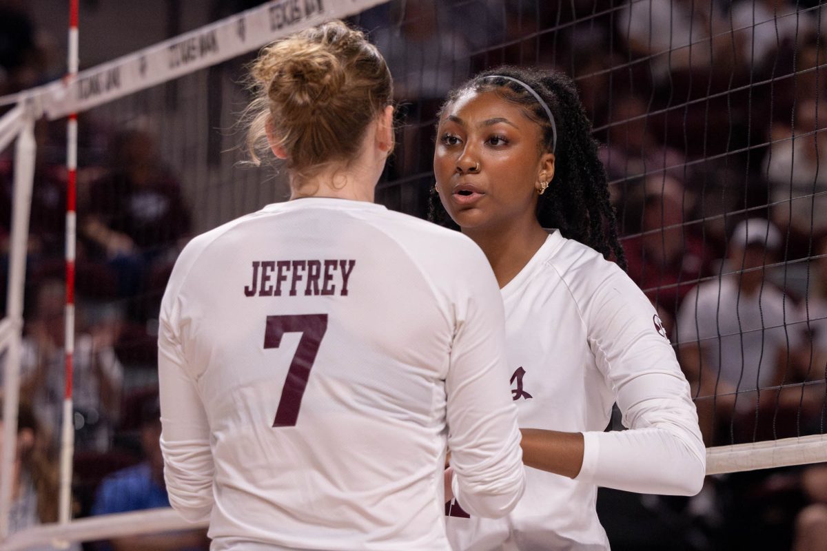 Texas A&amp;M middle blocker Morgan Perkins (21) talks to Texas A&amp;M outside hitter Brooke Jeffrey (7) during Texas A&amp;M’s game against Mississippi State in Reed Arena Sunday, Nov. 3, 2024. (Kelii Horvath/The Battalion)