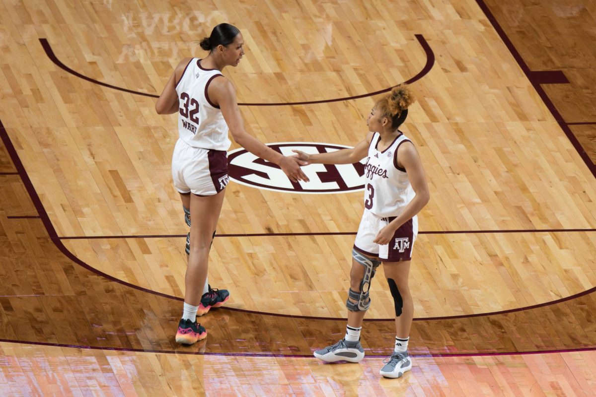 Texas A&M forward Lauren Ware (32) and Texas A&M guard Erica Moon (3) celebrate during Texas A&M’s game against Western Michigan at Reed Arena on Sunday, Nov. 10, 2024. (Trinity Hindman/The Battalion)