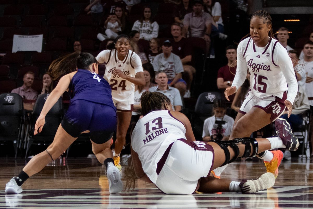 Texas A&amp;M forward Jada Malone (13) dives for a loose ball during Texas A&amp;M’s game against Northwestern State at Reed Arena on Sunday, November 17, 2024. (Rocio Salgado/The Battalion)