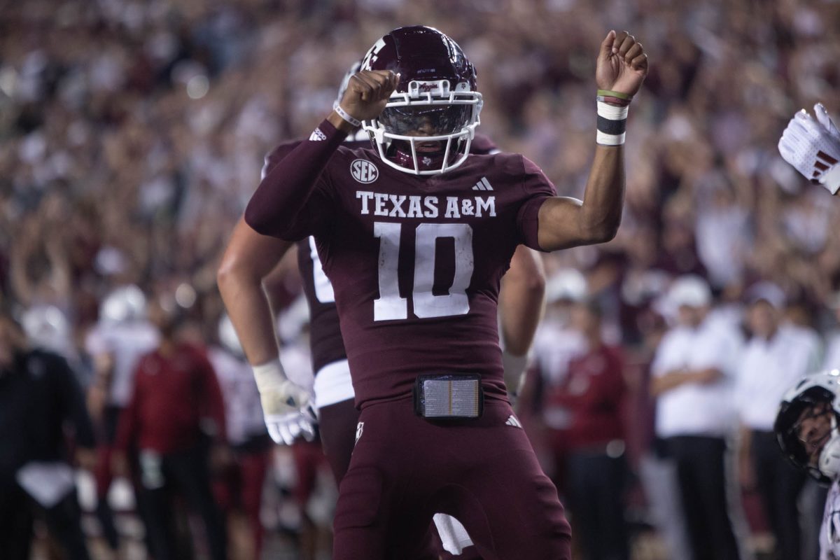 Texas A&amp;M quarterback Marcel Reed (10) celebrates after a touchdown during Texas A&amp;M’s game against New Mexico State at Kyle Field on Saturday, Nov. 16, 2024. (Trinity Hindman/The Battalion)