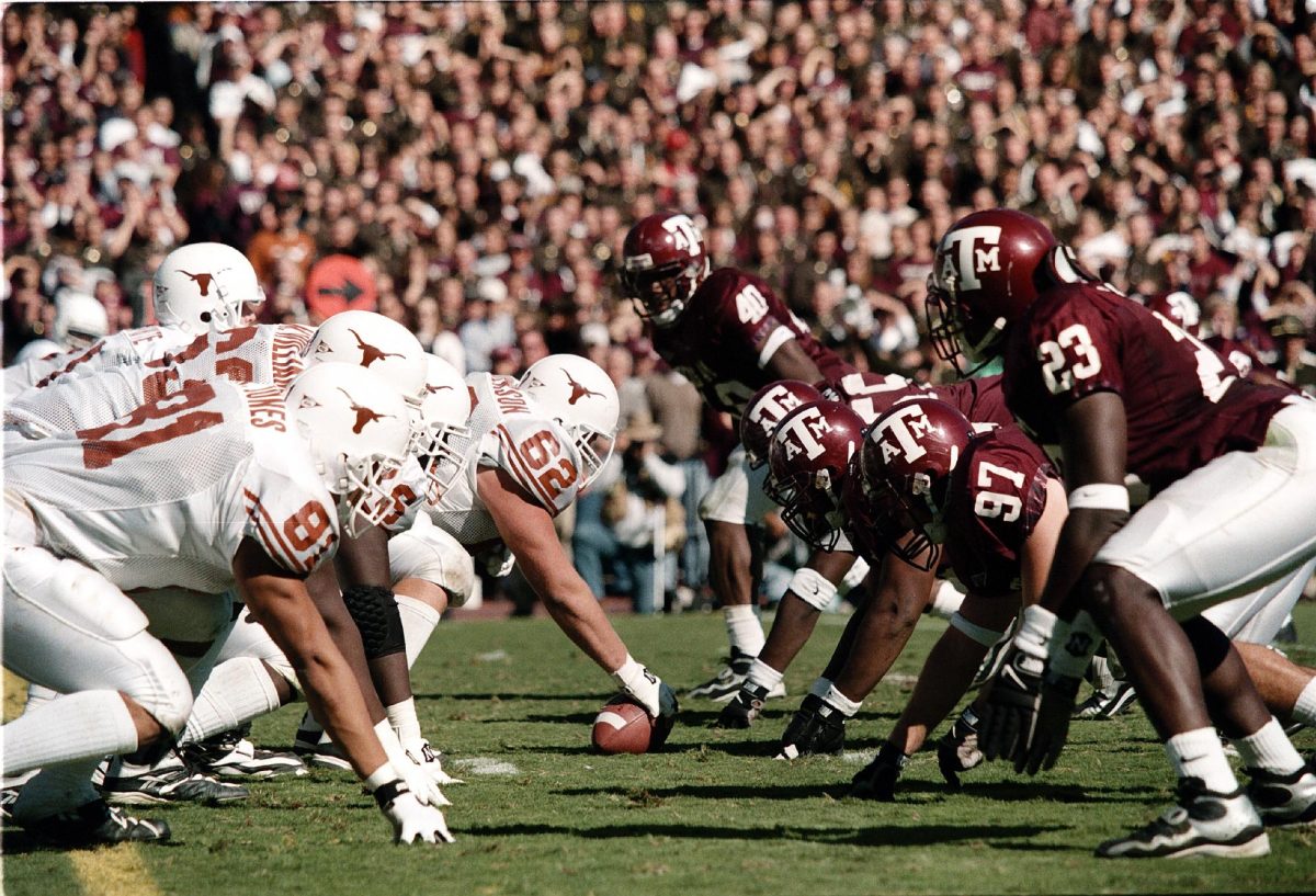 The Texas Longhorn offense lines up against the Texas A&M Aggies defense during the Texas A&M-Texas football game at Kyle Field on Nov. 26, 1999. (Photo courtesy of Texas A&M Athletics)