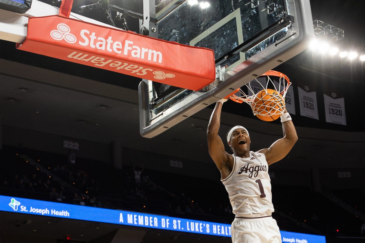 Texas A&amp;M guard Zhuric Phelps (1) dunks the ball during Texas A&amp;M's match against Southern University at Reed Arena on Wednesday, Nov. 20, 2024. (Adriano Espinosa/The Battalion)