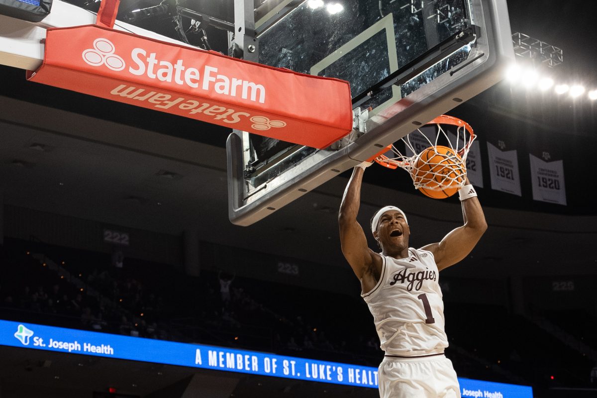 Texas A&amp;M guard Zhuric Phelps (1) dunks the ball during Texas A&amp;M's match against Southern University at Reed Arena on Wednesday, Nov.. 20, 2024. (Adriano Espinosa/The Battalion)