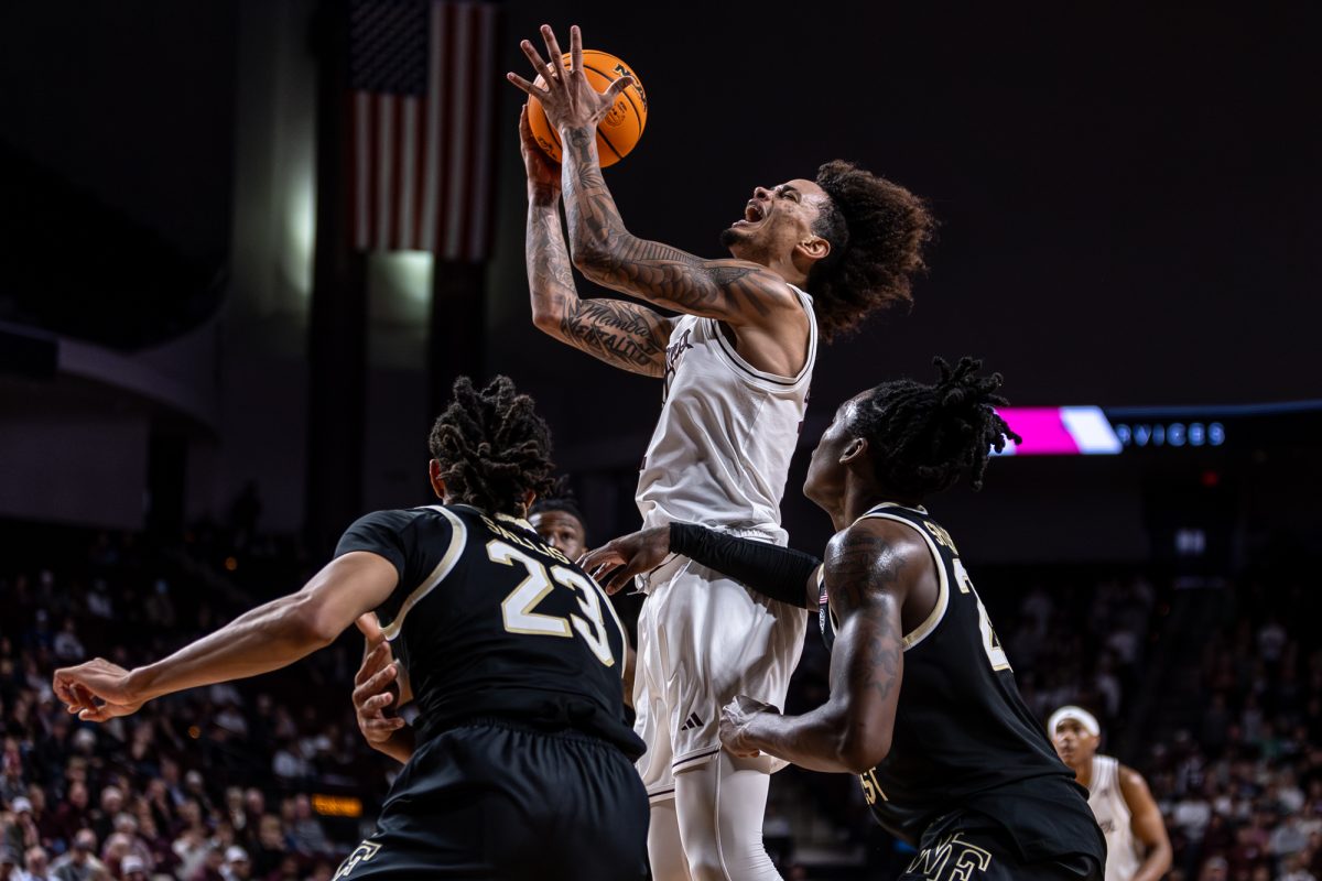 Texas A&amp;M forward Andersson Garcia (11) recovers the ball during Texas A&amp;M’s game against Wake Forest at Reed Arena on Tuesday, Dec. 3, 2024. (Jackson Stanley/The Battalion)