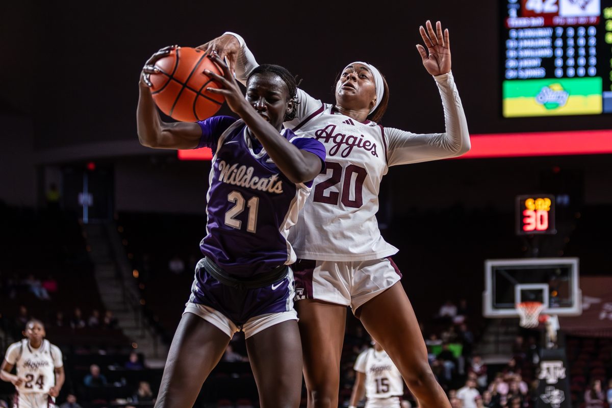 Texas A&amp;M guard Janae Kent (20) attempts to steal a rebound during Texas A&amp;M’s game against Kansas State at Reed Arena on Sunday, Dec. 8, 2024. (Jackson Stanley/The Battalion)