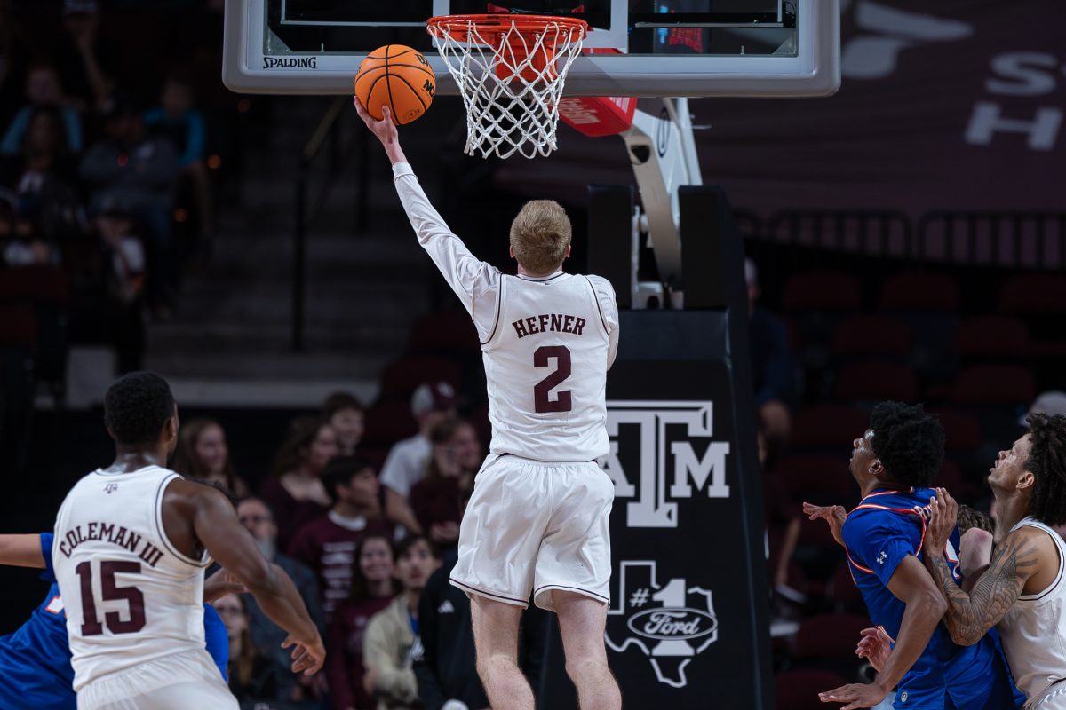 Texas A&M guard Hayden Hefner (2) shoots a layup during Texas A&M’s game against Houston Christian University at Reed Arena on Friday, Dec. 20, 2024. (Jackson Stanley/The Battalion)