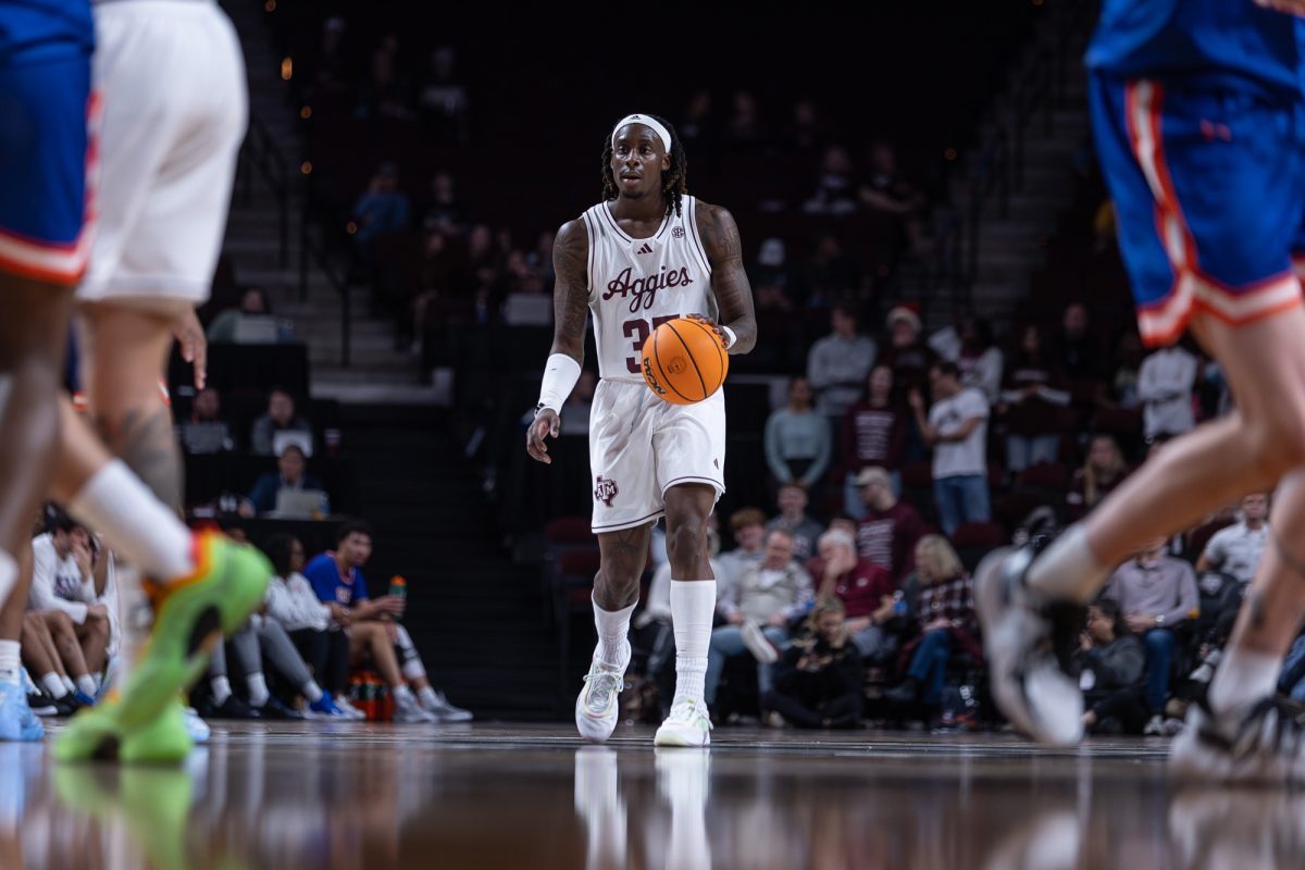 Texas A&amp;M guard Manny Obaseki (35) dribbles the ball down the court during Texas A&amp;M’s game against Houston Christian University at Reed Arena on Friday, Dec. 20, 2024. (Jackson Stanley/The Battalion)