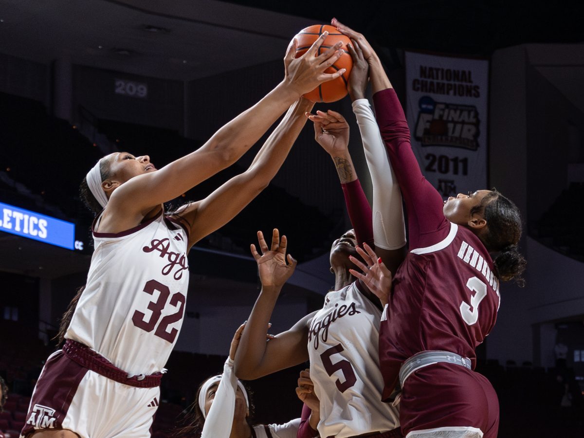 Texas A&M forward Lauren Ware (32) jumps for a ball against Texas Southern guard Aaliyah Henderson (3) during Texas A&M’s game against Texas Southern at Reed Arena on Monday, Dec. 16, 2024. (Hannah Harrison/The Battalion)