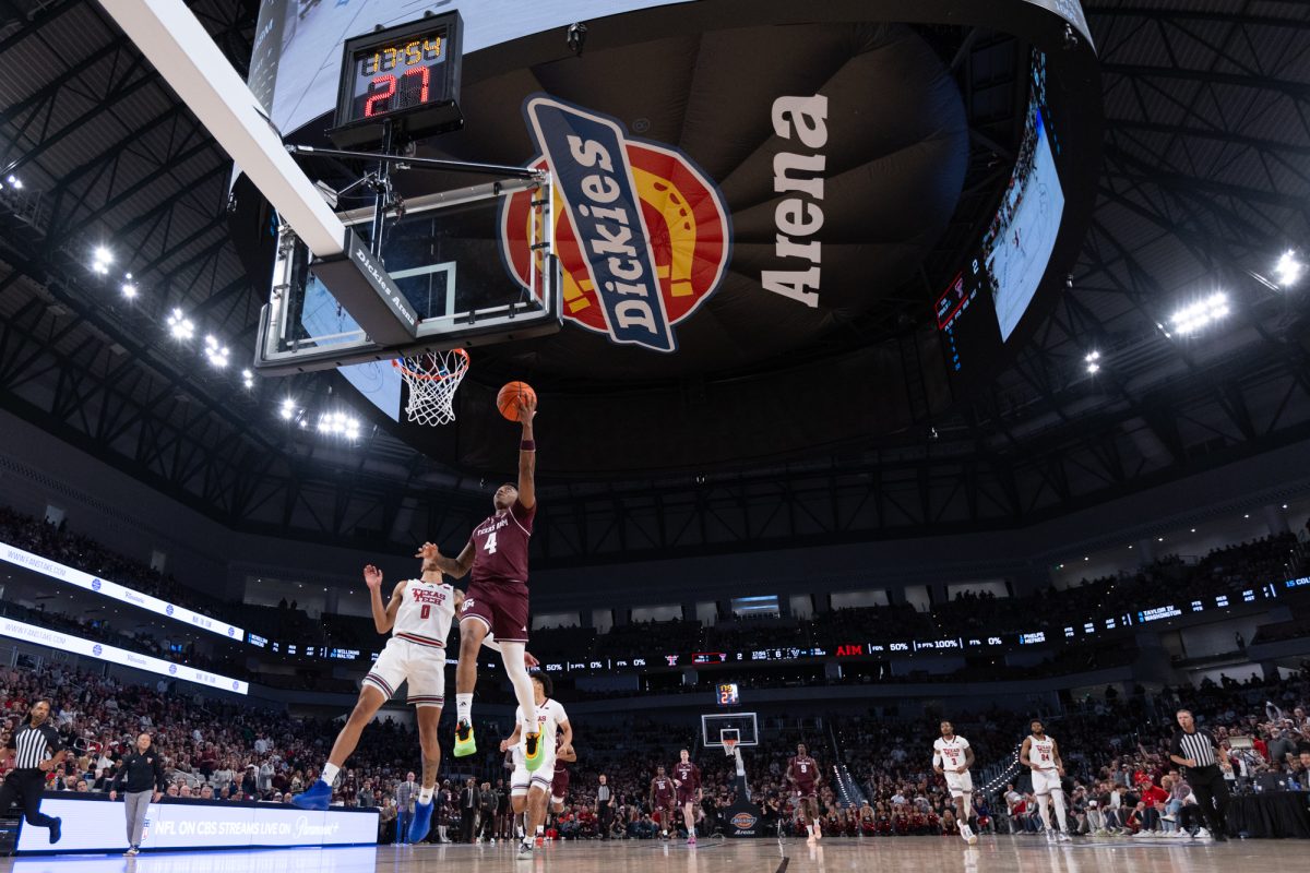 Texas A&amp;M guard Wade Taylor IV (4) makes a layup during Texas A&amp;M’s game against Texas Tech at Dickies Arena in Fort Worth, Texas on Sunday, Dec. 8, 2024. 