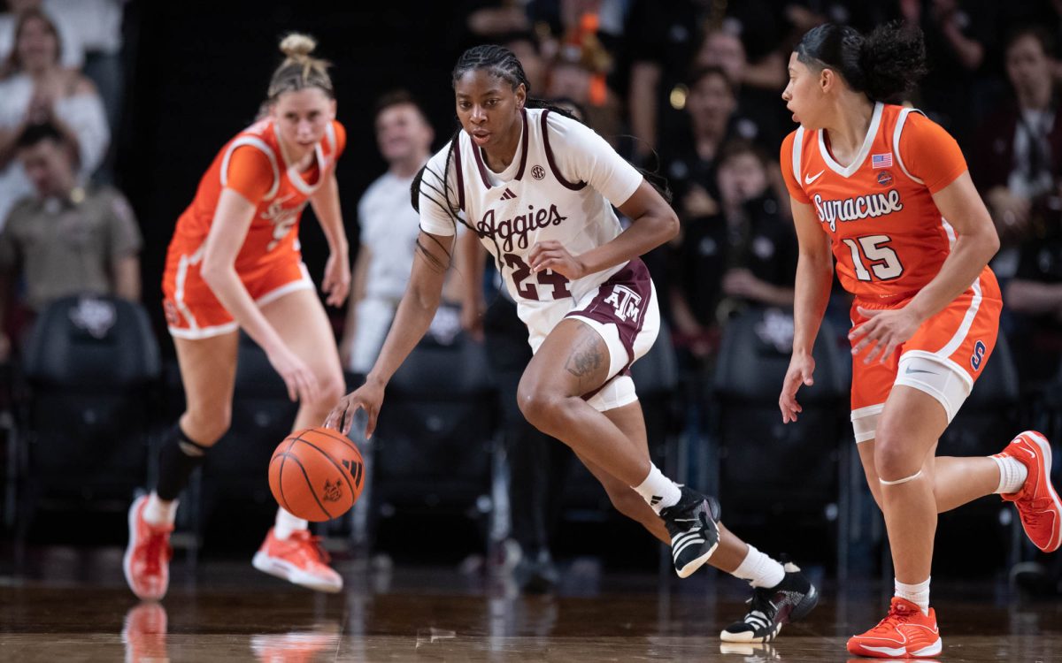 Texas A&amp;M guard Sahara Jones (24) dribbles the ball during Texas A&amp;M’s game against Syracuse at Reed Arena on Wednesday, Dec. 4, 2024. (Rocio Salgado/The Battalion)