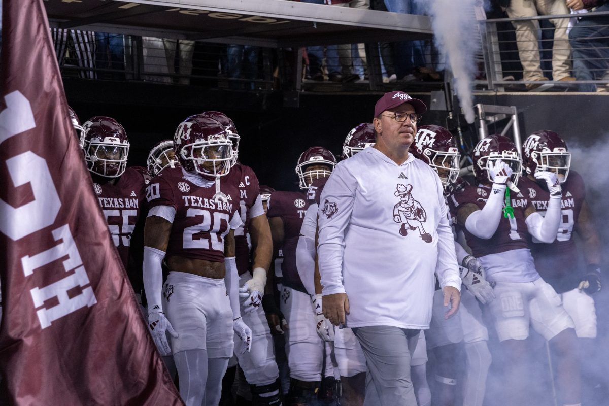 Texas A&M head coach Mike Elko and the Texas A&M football team enter Kyle Field before Texas A&M's game against Texas at Kyle Field on Saturday, Nov. 30, 2024. (Adriano Espinosa/The Battalion)