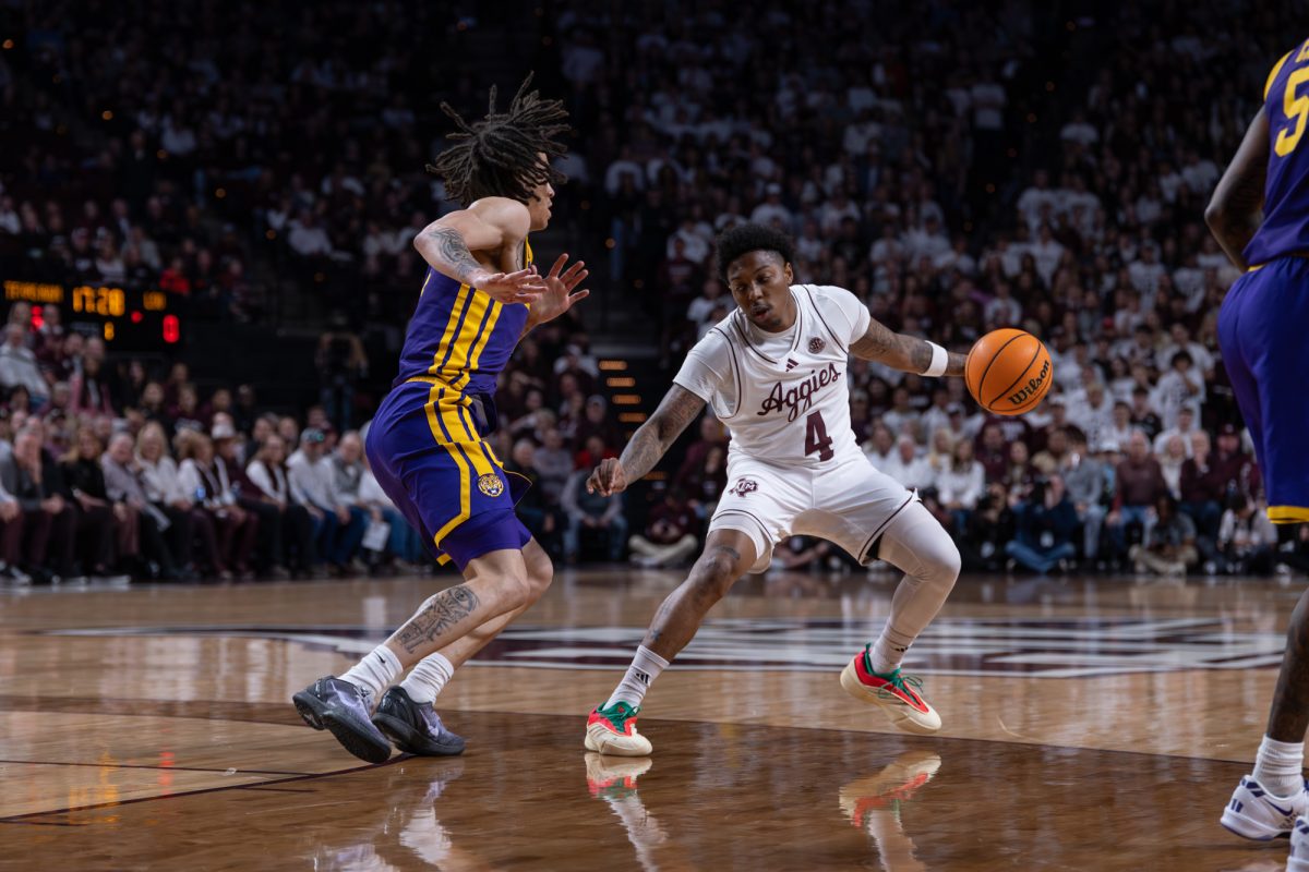 Texas A&M guard Wade Taylor IV (4) jukes an opponent during Texas A&M’s game against LSU at Reed Arena on Saturday, Jan. 18, 2025. (Jackson Stanley/The Battalion)