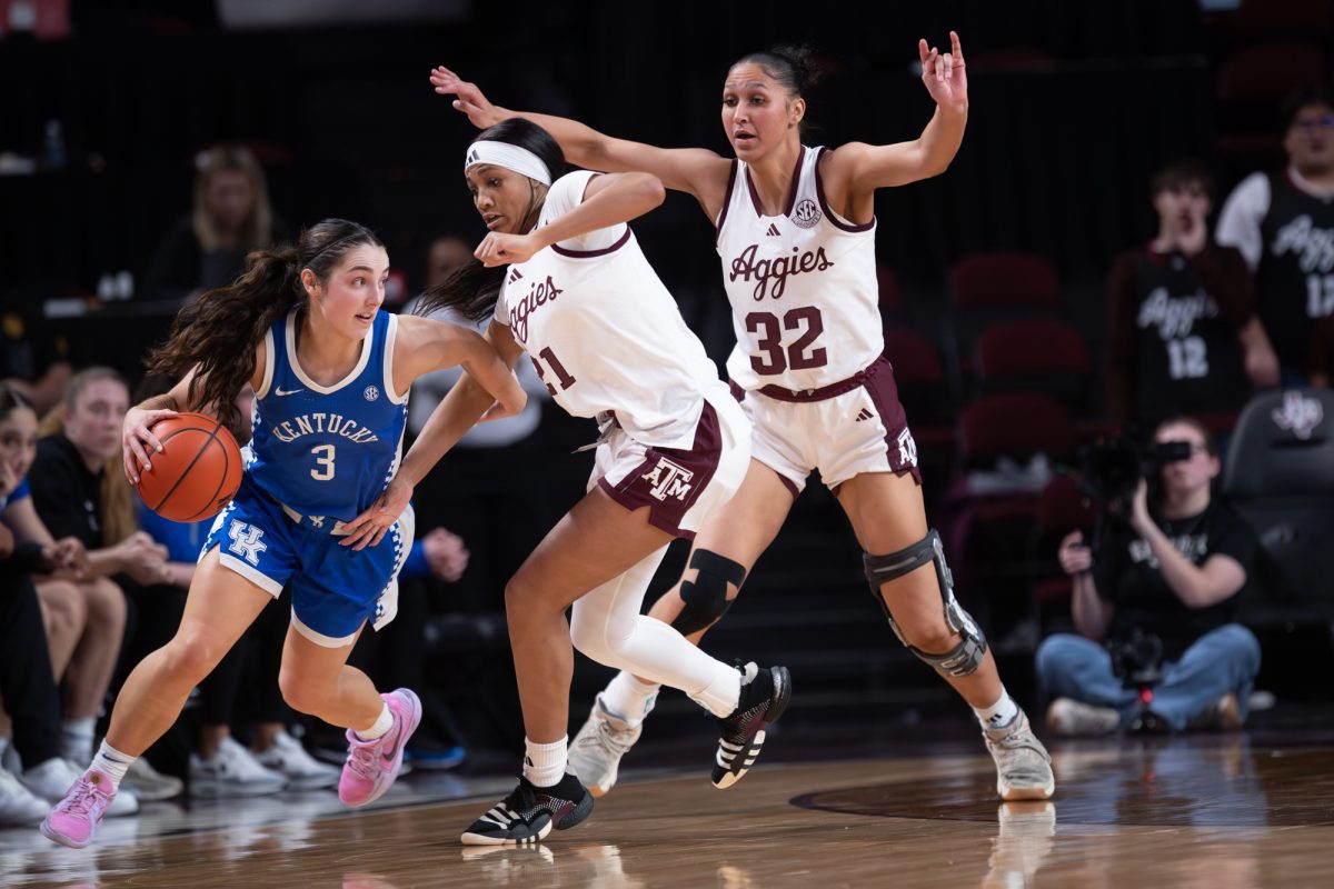 Texas A&M guard Taliyah Parker (21) and Texas A&M forward Lauren Ware (32) guard Kentucky guard Georgia Amoore (3) during Texas A&M's game against Kentucky at Reed Arena on Thursday, Jan. 23, 2025. (Sarthak Dalal/The Battalion)