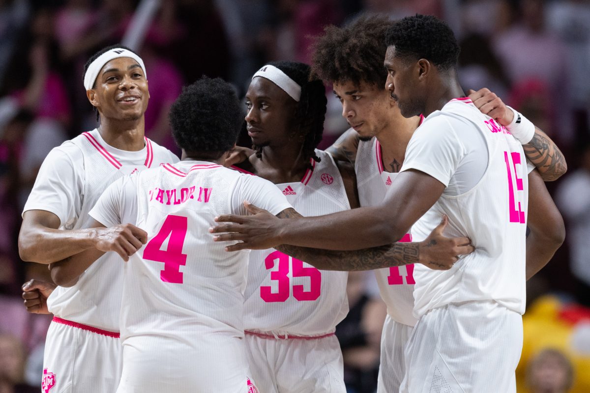 Texas A&M Basketball Team huddles during Texas A&M's game against Oklahoma at Reed Arena on Tuesday, Jan. 28, 2025. (Adriano Espinosa/The Battalion)