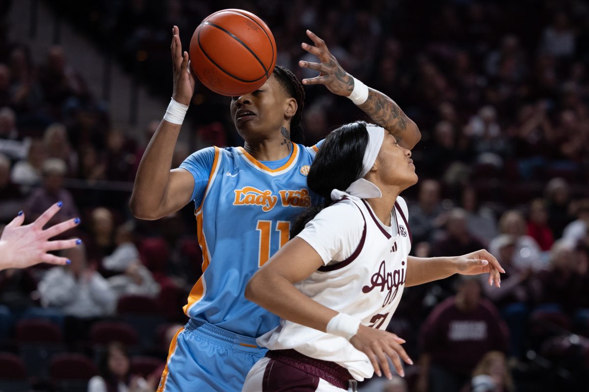 Texas A&amp;M guard Taliyah Parker (21) gets wrapped up between Tennessee forward Zee Spearman (11) during Texas A&amp;M’s game against Tennessee at Reed Arena on Thursday, Jan. 2, 2025. (Chris Swann/The Battalion)