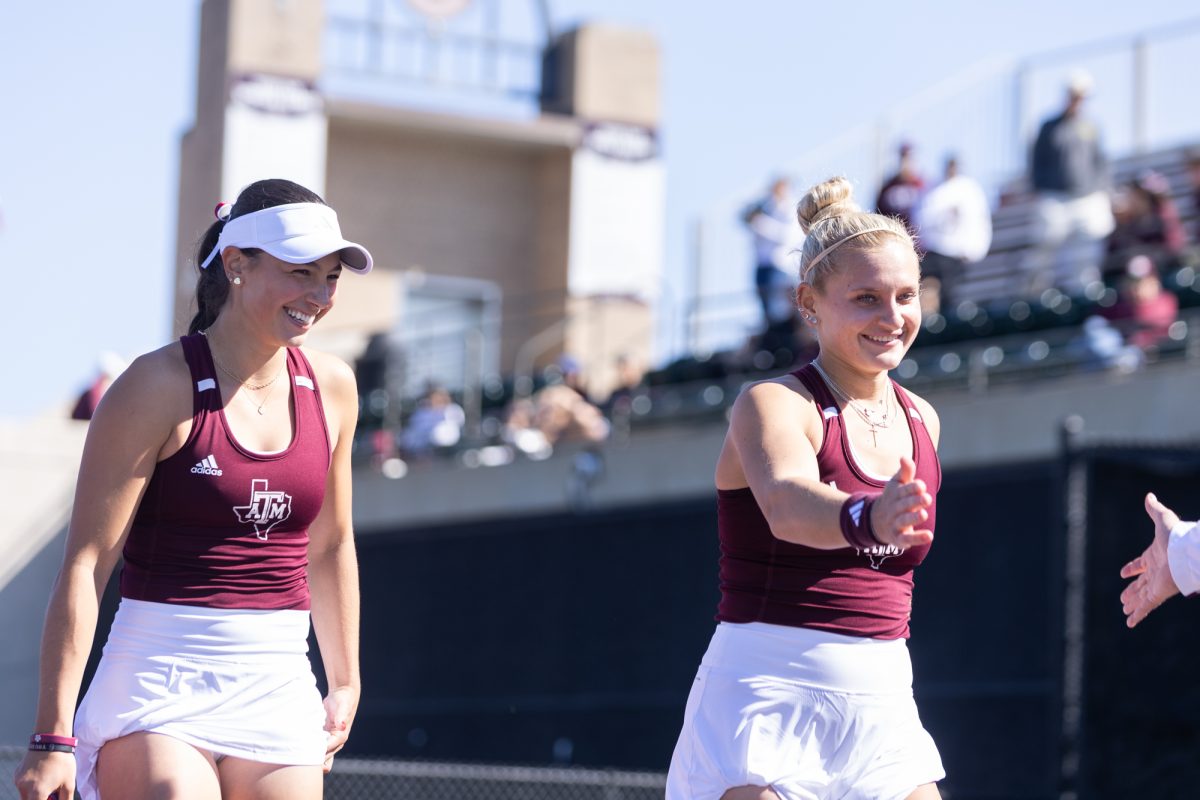 Junior Mia Kupres and Junior Daria Smetannikov react after winning a set during Texas A&M's match against San Diego at Mitchell Tennis Center on Friday, Jan. 31, 2025. (Adriano Espinosa/The Battalion)