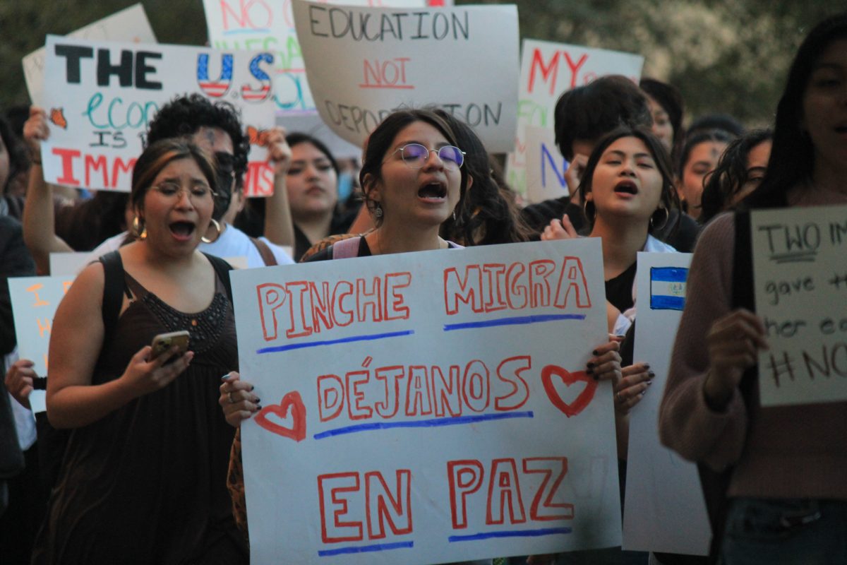 Protesters chant at the "Protest for immigrants" in front of Evans Library on Wednesday, March 5, 2025. (Jenna Isbell/The Battalion)