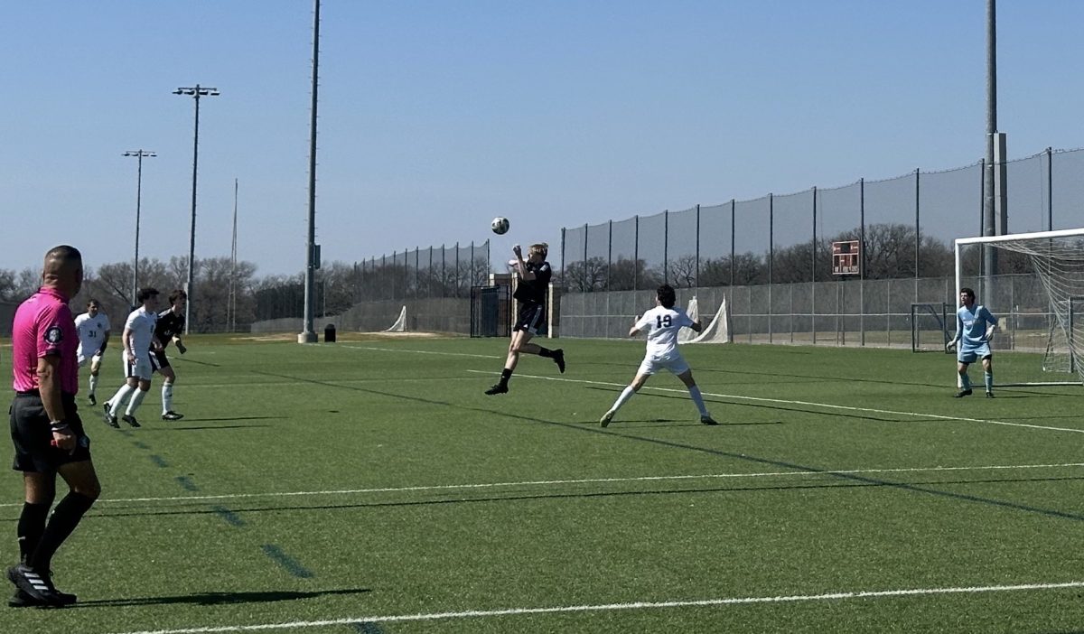 Texas A&M Engineering at Blinn freshman Aaron Keating heads the ball for Texas A&M club soccer against Baylor on Saturday, March 1, 2025, at the Penberthy Sports Rec Complex. 